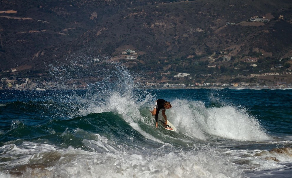 Harley Nelson com a famosa praia de Malibu ao fundo. Foto: Andre Magarao